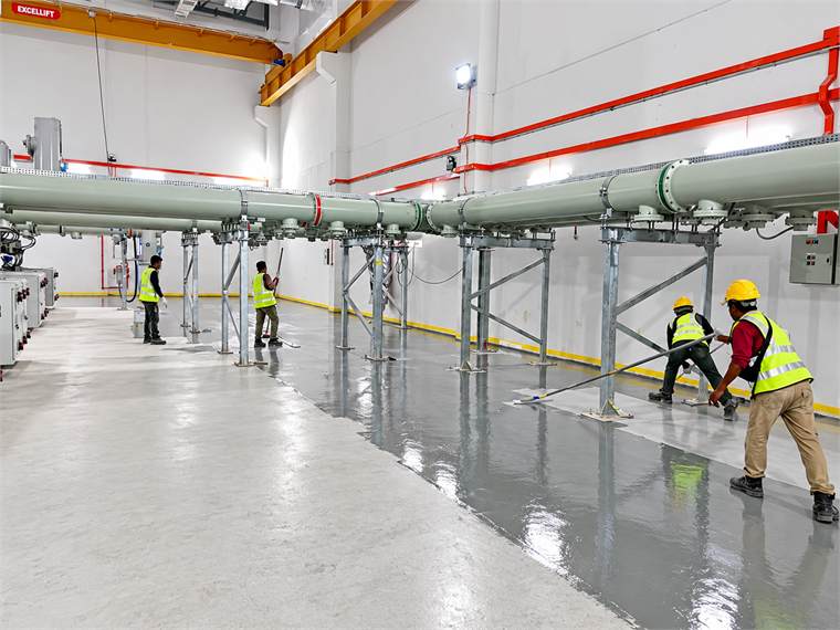 Epoxy flooring works beside equipment area